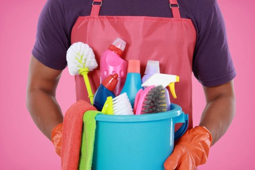 Local carpet cleaning team preparing equipment for a property