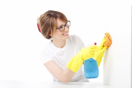 Team member following safe carpet cleaning procedures